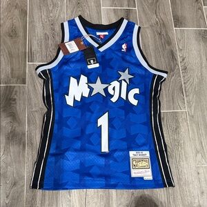 Mitchell & Ness Blue Magic Jersey with Black and White Accents